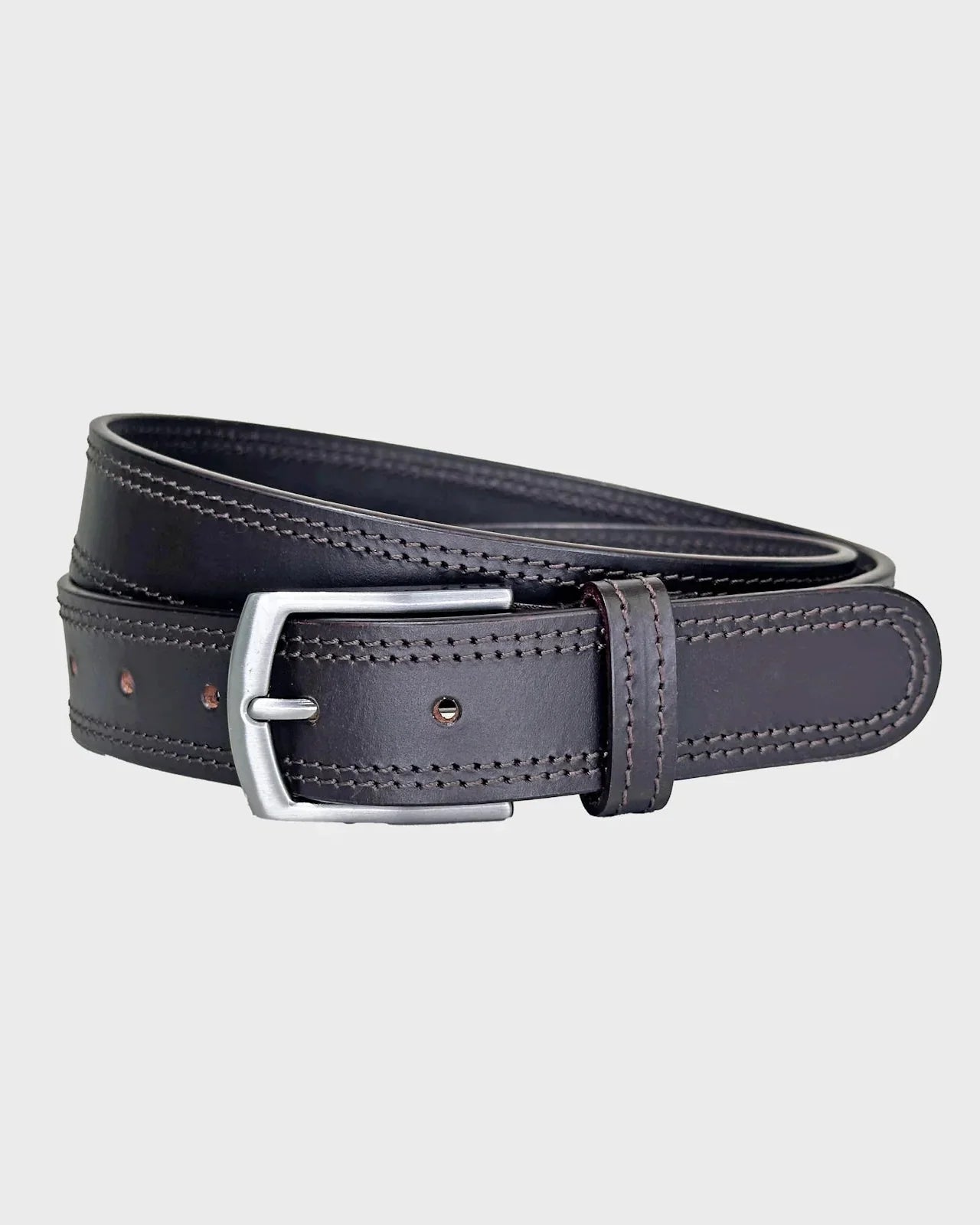 Brown leather belt on a light gray background