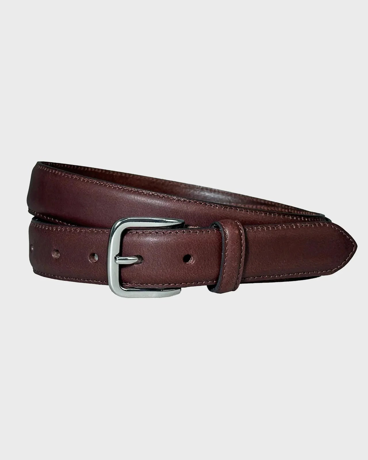 Brown leather belt on a light gray background