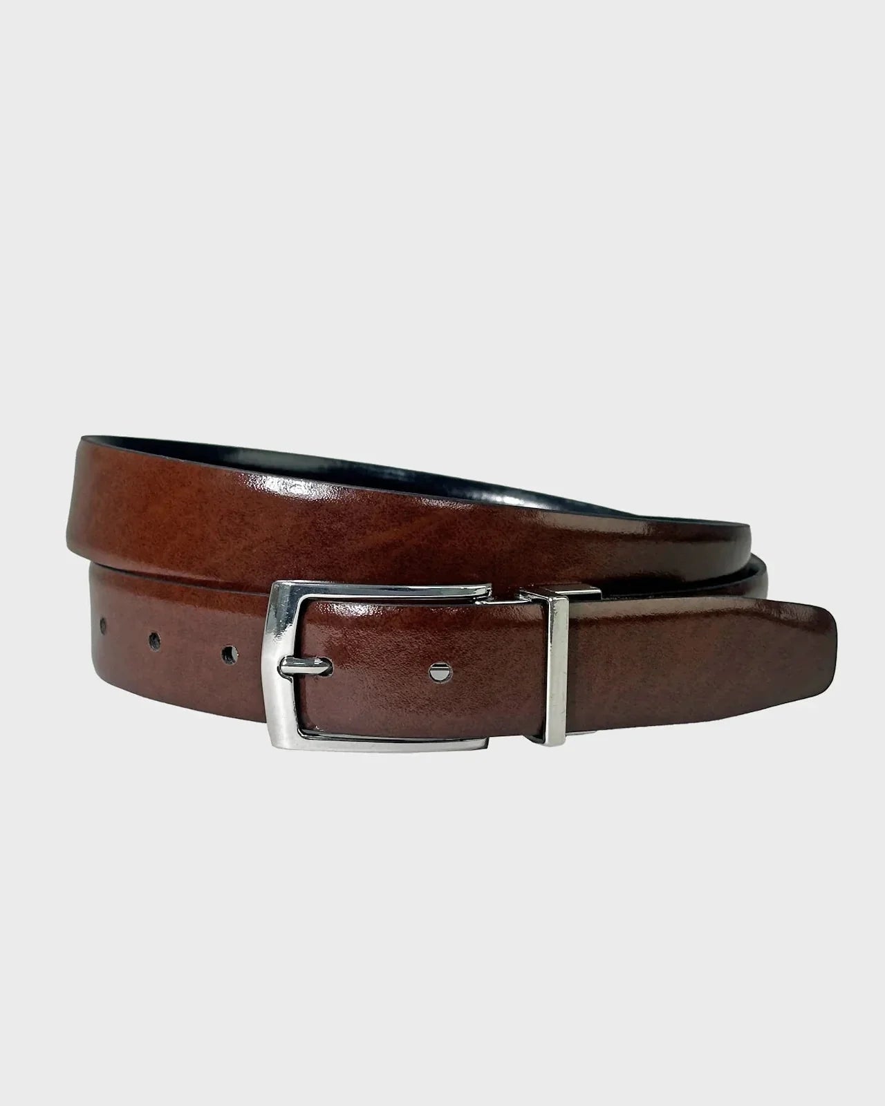 Brown leather belt with silver buckle on a light gray background